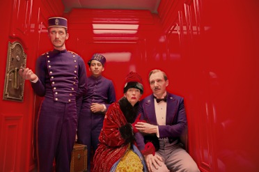 Purple pros: Ralph Fiennes comforts Tilda Swinton in the lift of the Grand Budapest Hotel